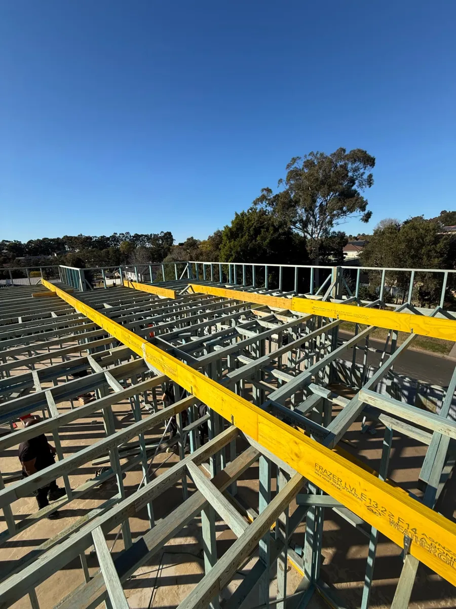 LVL beams and upper floor joists on a two-storey home frame in Western Sydney by Jirah Carpentry